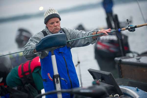 <p>
	Jeff Jennings inspects his rods and looks to improve in the standings on Day Two.</p>
