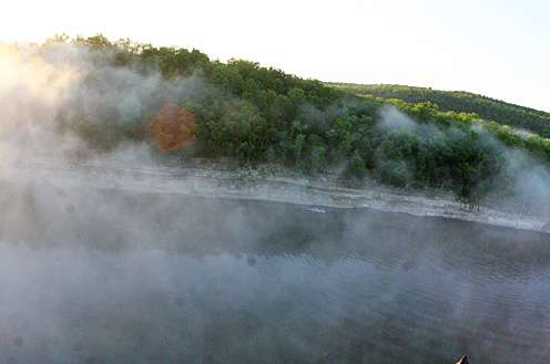 <p>
The wind and sun were beginning to break up the fog.</p>