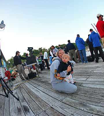 <p>
Mike Iaconelliâs wife, Becky, and son, Vegas, watch as the Day One launch begins.</p>