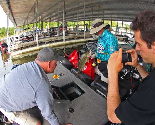 Rick Clunn pulls out one of his biggest bass after a successful Day One.
