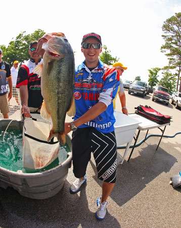 Carl Jocumsen is all smiles after catching this hefty Table Rock largemouth.
