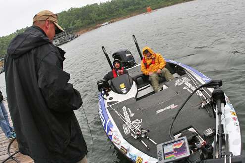 <p>
	Brandon Palaniuk, Day One leader of the TroKar Quest, comes into the Bull Shoals Lake Boat Dock early on Friday.</p>
