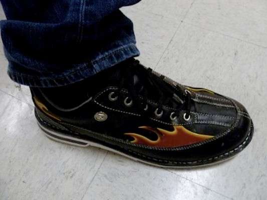<p>
	And he has his own bowling shoes with FLAMES on them...</p>
