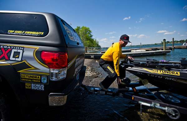 <p>
	Swindle loading his boat onto his truck and trailer. </p>
