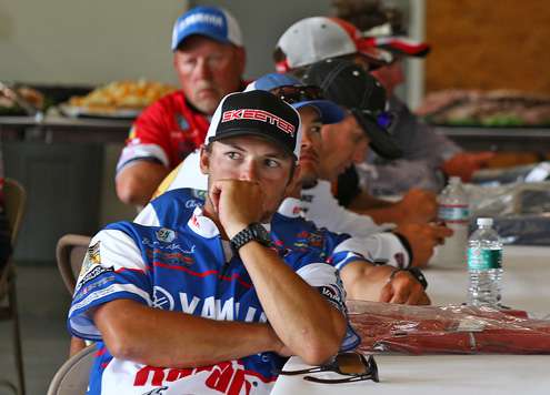 <p>
	Bull Shoals champion Brandon Palaniuk listens to the rules.</p>
