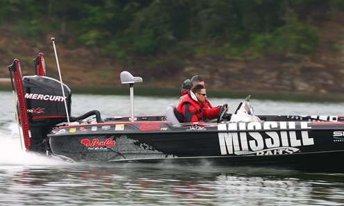 <p>
	John Crews speeds across Douglas Lake to his next fishing spot. </p>
