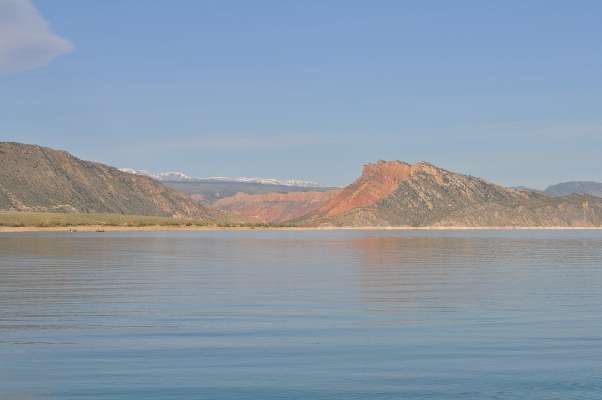 <p>
	Snow-capped mountains set a scenic backdrop for the Western Divisional. The red cliffs are what the Flaming Gorge is named for.</p>
