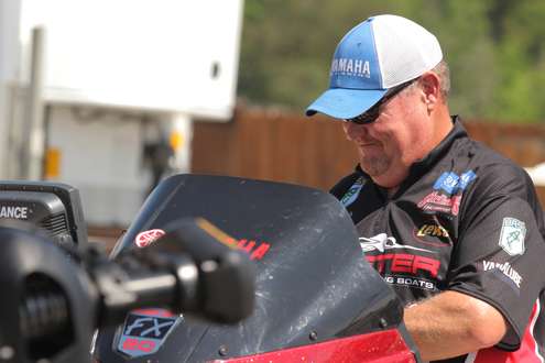 <p>
	Veteran angler Mark Davis waits for the weigh-in to get started.</p>
