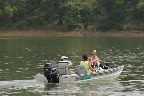 <p>
	A couple of fans show up to watch the weigh-in by boat.</p>
