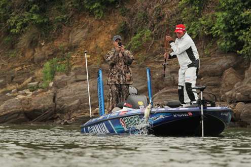 <p>
	Rojas flips another one into the boat.</p>
