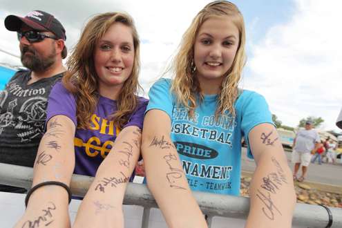 <p>
	These girls got their arms signed by their favorite anglers.</p>
