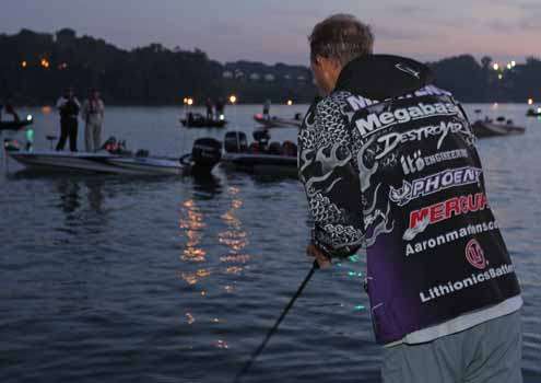 <p>
	Aaron Martens sits in third with a 57-12 and tunes his crankbaits.</p>
