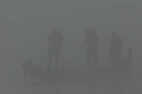 <p>
	The fog was so thick, anglers were almost hard to pick out on the water.</p>
