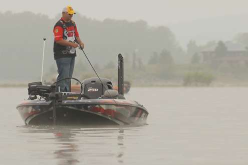 <p>
	The air starts to clear as Jeremy Starks searches for a lunker.</p>
