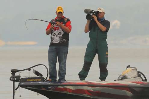 <p>
	The cameraman focuses on Jermey Starks, waiting for him to bring in another lunker.</p>
