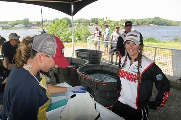 <p>
	The University of Thomasâ Michaela Anderson with teammate Bryan Billeadeu at the fish checking station.</p>
