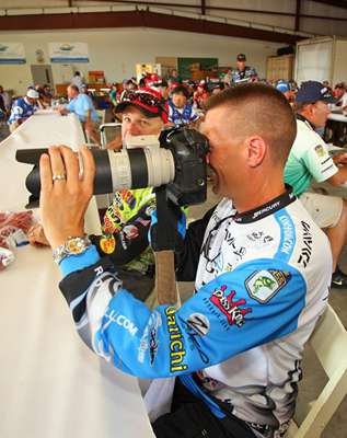 <p>
	Randy Howell snags a camera and snaps some shots.</p>
