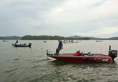 <p>
	Several spectator boats were following tournament leader Aaron Martens. </p>
