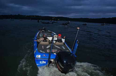 <p>
	Dean Rojas pulls away from the dock as Day Three starts.</p>
