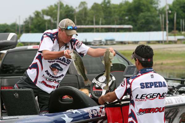 <p>
	Trent Newman and Jacob Sepeda of Dallas Baptist University bag their day one catch. </p>
