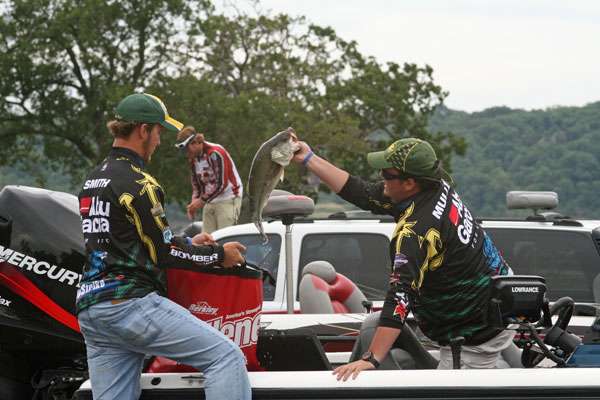<p>
	The big bass of the day weighing 5-10 goes into the bag for Arkansas Techâs Jordan Mullenix and Evan Smith.</p>
