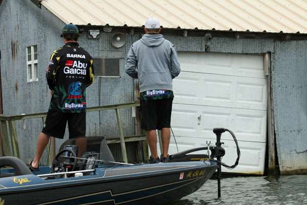 <p>
	Evan Barnes and Aaron Sarna of Arkansas Tech fish a series of boat houses positioned near a deep channel drop. </p>
