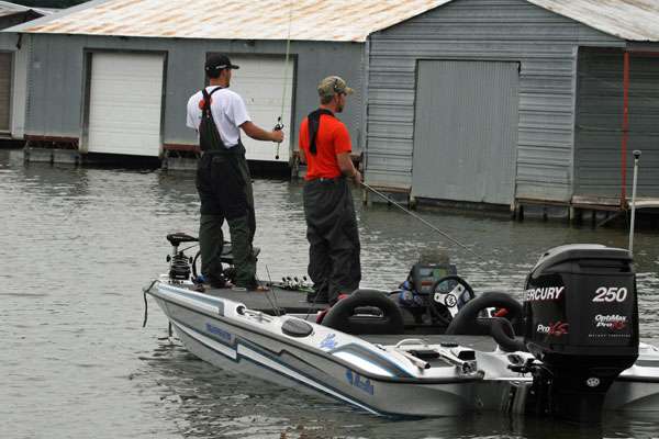 <p>
	Day One leaders Zack Birge and Blake Flurry of Oklahoma State fish a lineup of boat houses located in a creek adjacent to the main river channel. </p>
