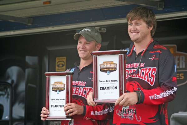 <p>
	Keith Billingsley and Mook Miller are all smiles as they hold the first place trophies. </p>
