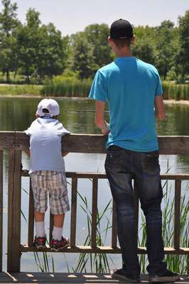 <p>
	Matt Bach takes his nephew, Brayden, fishing. Brayden, 5, was learning about fishing from his uncle at the familyâs annual pig roast in July 2011 in Half Day, Ill. An hour later, Brayden reeled in his first bass ever.</p>
