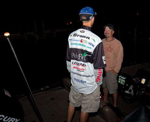 <p>
	Ron Hanke talks shop with Dakota Brown prior to launch on Day One of the first Bass Pro Shops Bassmaster Northern Open of 2012.</p>
