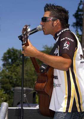 <p>
	Brian Schram performs on the weigh-in stage at the Richmond, Va., Bass Pro Shops. Schram also competed in the tournament, his first Bass Pro Shops Bassmaster Open as a pro.</p>
