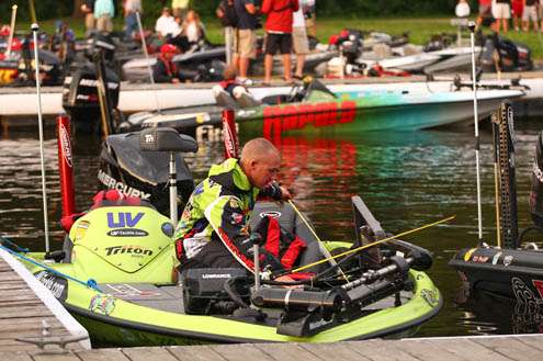 <p>Current AOY points leader Brent Chapman prepares his equipment for Day Three on the Mississippi River Rumble. </p>
