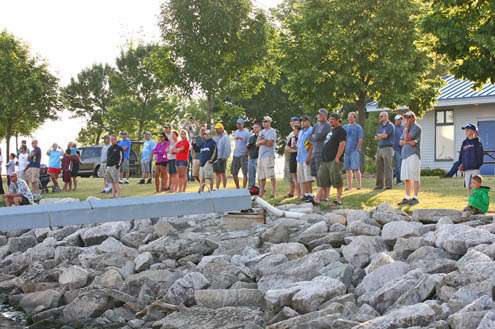 <p>
	A crowd of family and friends line the shore as Day Two of the Green Bay Challenge gets underway.</p>
