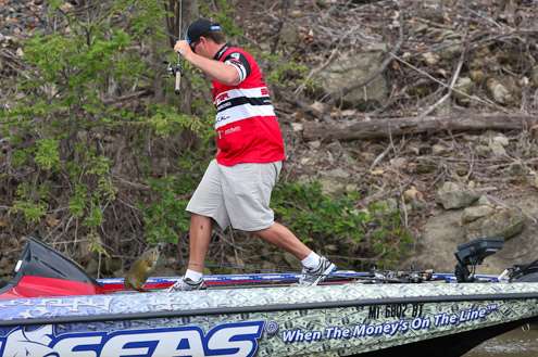 <p>
	Pace flips a Smallie right next to his rig.</p>
