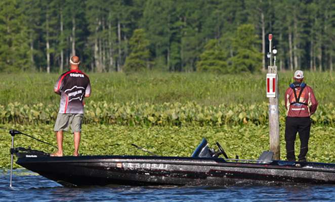 <p>
	Greg Cooper and Co-Angler Bob Ebel of California work the pads.</p>
