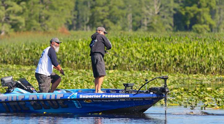<p>
	Hawk hooks his second fish of the day as Robert Pelletier secures the net.</p>
