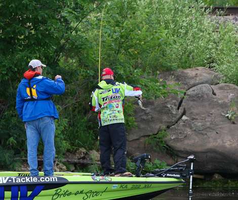 <p>
	Brent lands a small bass as his Marshal takes a video. </p>
