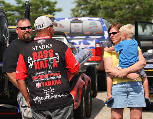 <p>
	Jeremy Starks talks with his fans at the boat ramp on Day 2.</p>
