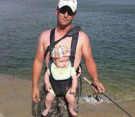 <p>
	Why wait until your child can walk before you take him fishing? Just tote them along with you, like Chance Towner does with his son, Talon.</p>
