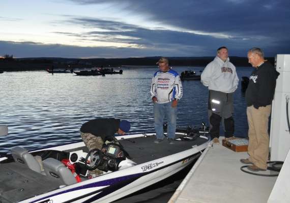 <p>
	Franco Vallejos of New Mexico readies his boat for take-off. His co-angler, Arizonaâs Michael Zimmerman, waits patiently. Vallejos is the first boat for launch.</p>
