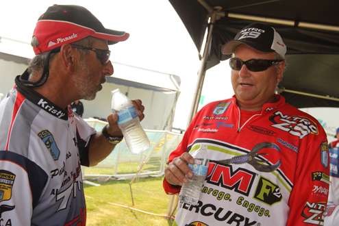 <p>
	 </p>
<p>
	Paul Elias and Matt Reed drink a cold water and talk about the day's fishing.</p>
