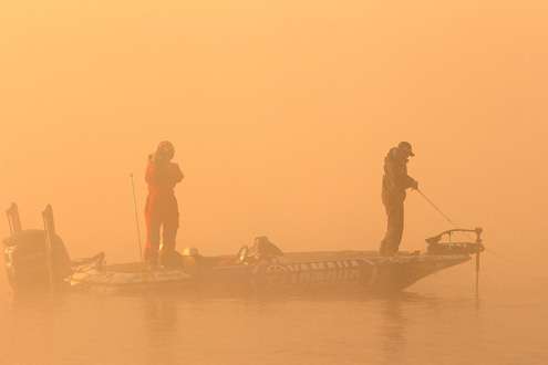 <p>
	Brandon Palaniuk fishes in dense fog on Bull Shoals Lake.</p>
