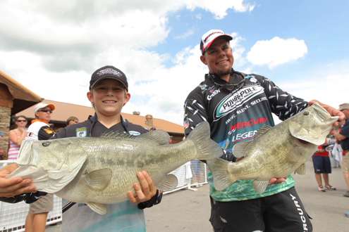 <p>
	Chris Lane and son with a special trophy.</p>
