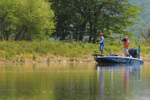 <p>
	Dean Rojas tries his luck in shallow water at Douglas Lake.</p>
