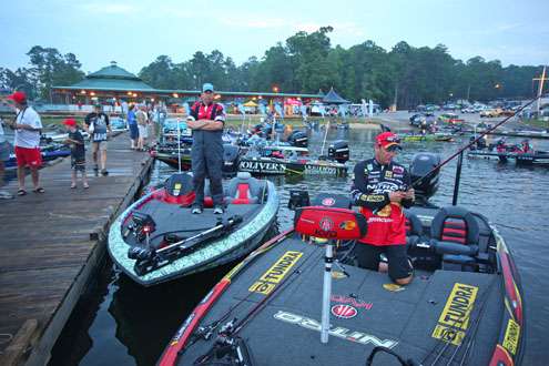 <p>
	Cliff Pace watches as Kevin VanDam rigs up a few rods.</p>
