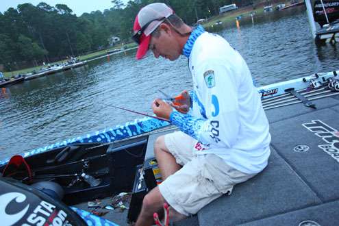 <p> 	Casey Ashley holds down the seventh spot with 54-14 and tunes his baits.</p> 