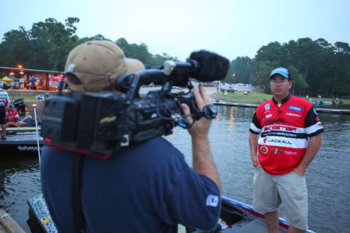 <p> 	Cliff Pace, in fourth place with 57-12, talks with the camera crew about his final-day strategy.</p> 