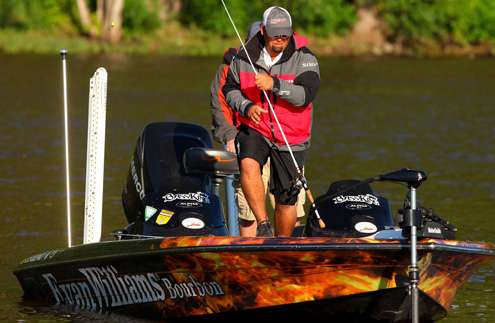 <p>
	Quinn is on a nice school of bass and returns quickly to the front deck to make another cast.</p>
