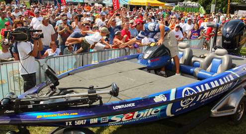 <p>
	Todd Faircloth is pulled to the weigh-in stage on the final day of the Mississippi River Rumble.</p>
