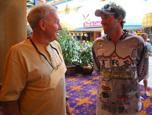 <p>
	Jerry McKinnis and Wisconsin native Travis Manson, visit about the fishing potential on Green Bay.</p>
